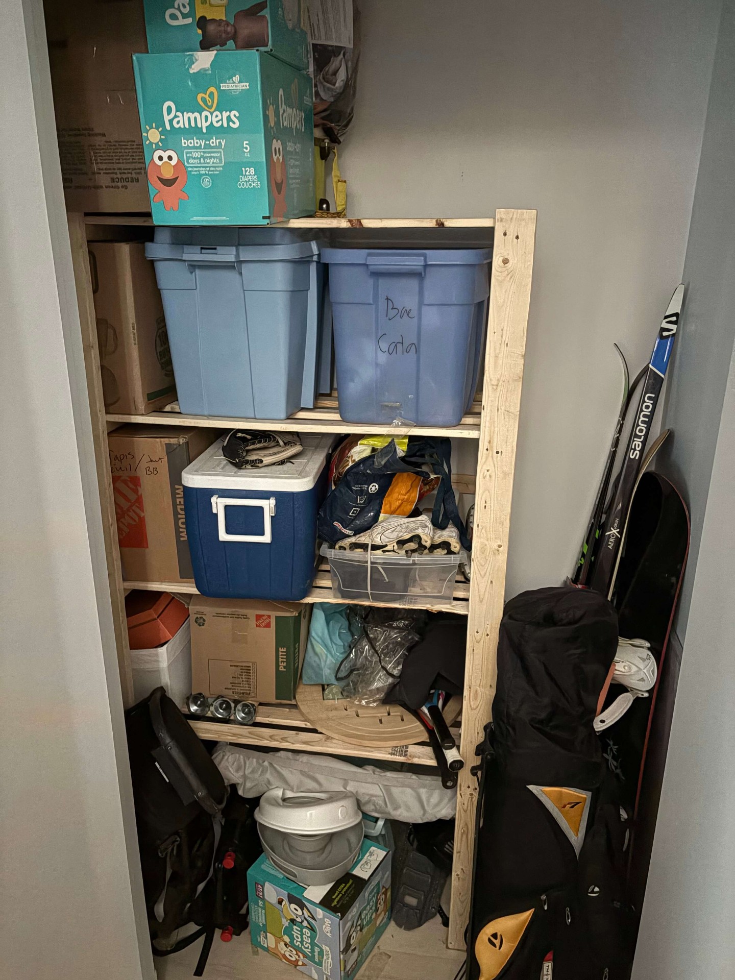 Bedroom with clothes and belongings