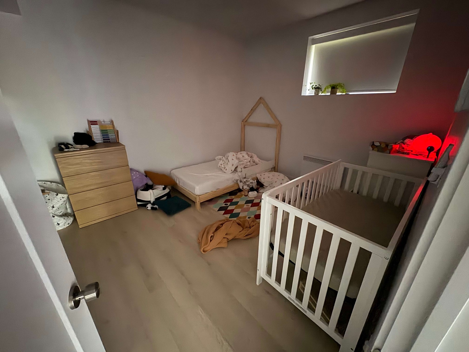 Kids room with crib and furniture