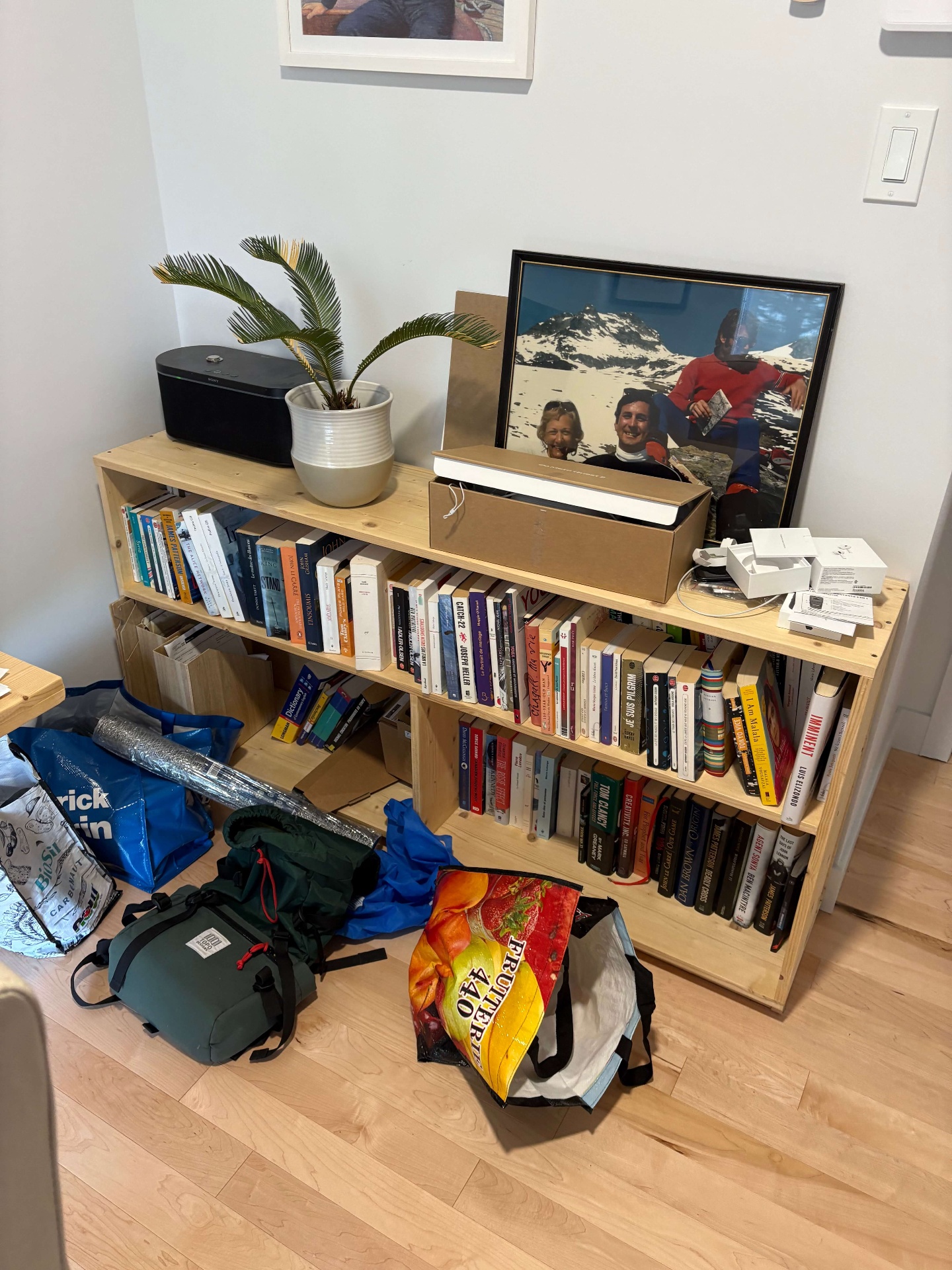 Office area with bookshelf and items